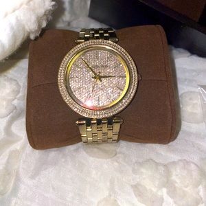 MK women’s watch, just needs a new battery. Small wear on the clasp